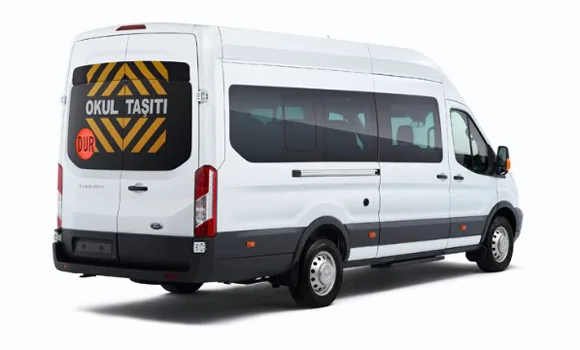 Arkasında OKUL TAŞITI yazısı ve dur lambası bulunan öğrenci servis aracı